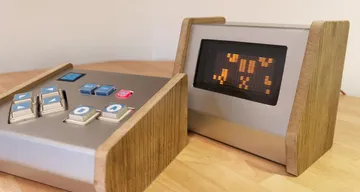 Arduino games console with a vacuum fluorescent display