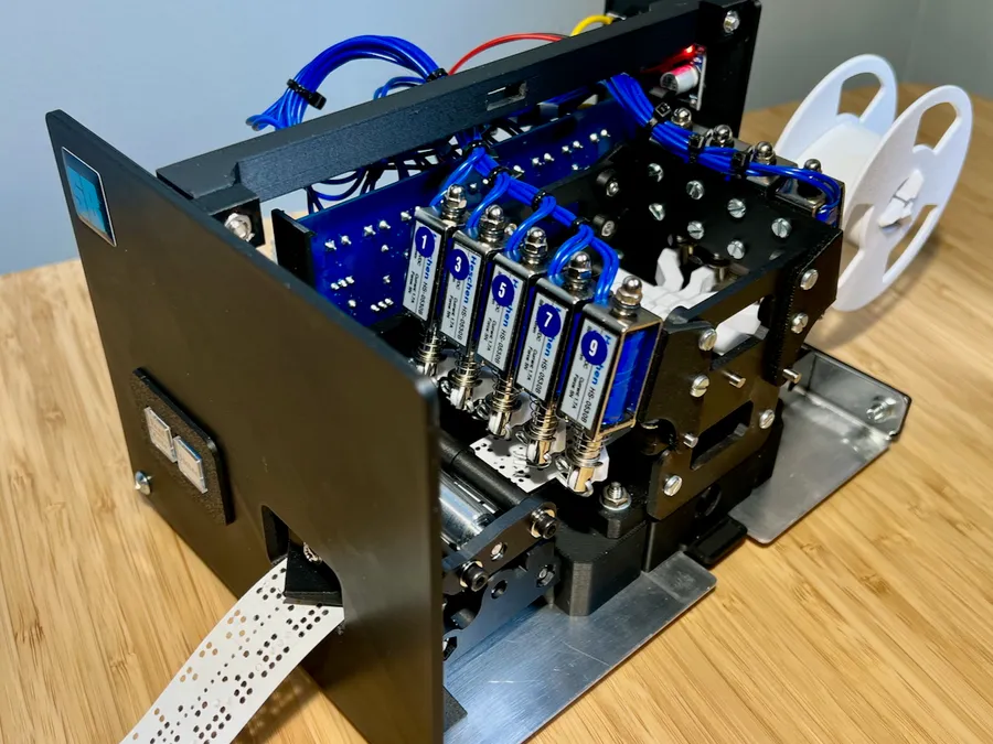 Click to view full size - Positioning 5 punches on one side and 4 on the other kept the design quite compact