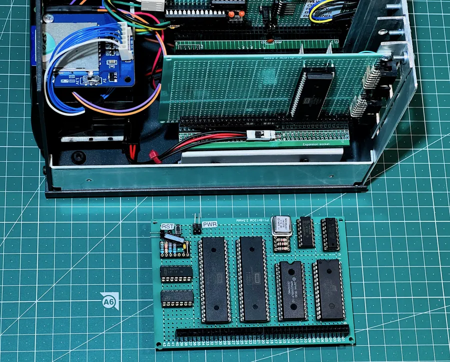 Click to view full size - The main board of the Apple 1 containing CPU, ROM, RAM, address decoding and the PIA chip which communicates with the terminal